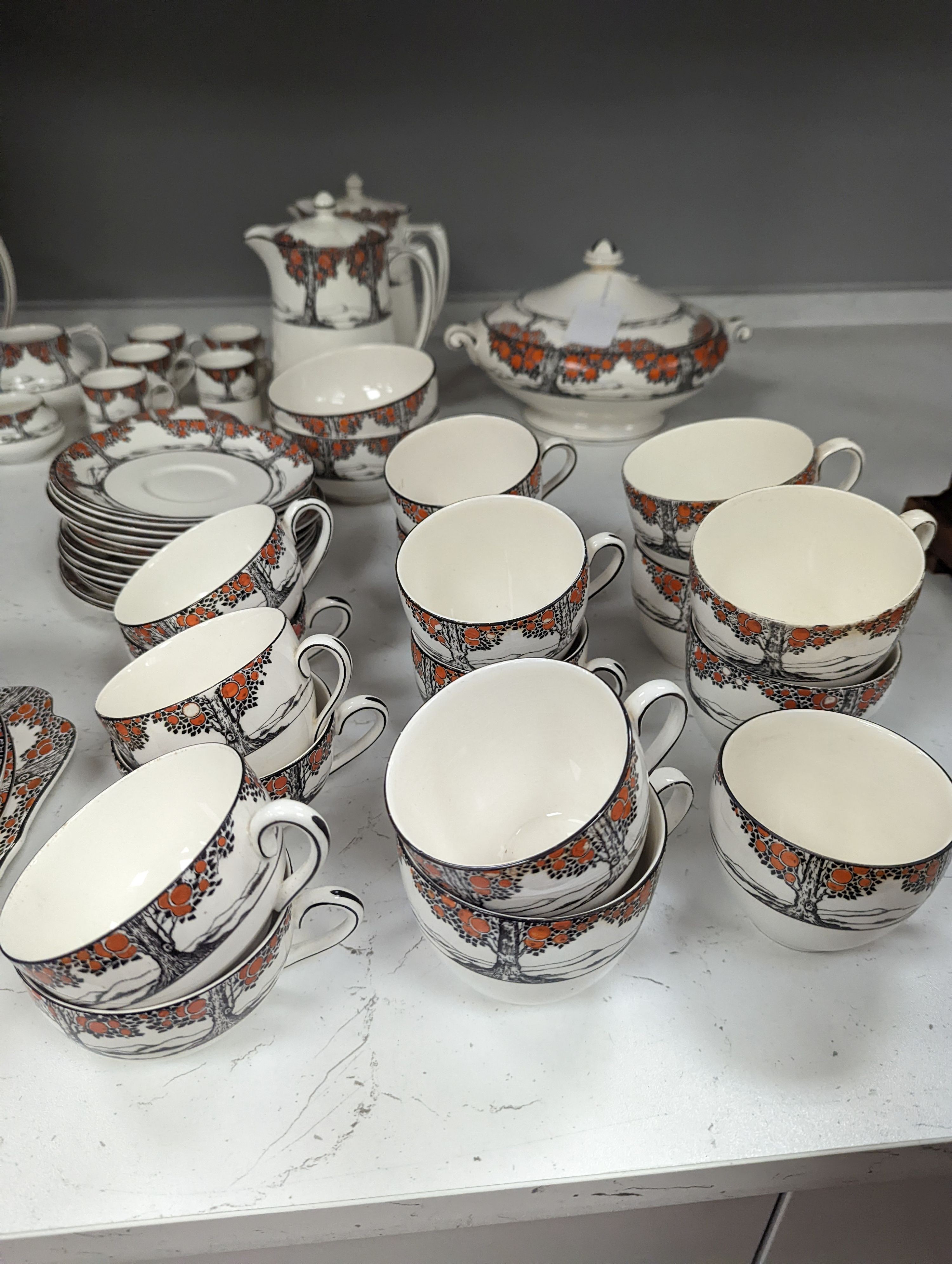 A Crown Ducal Orange Tree pattern tea, coffee and part dinner service
